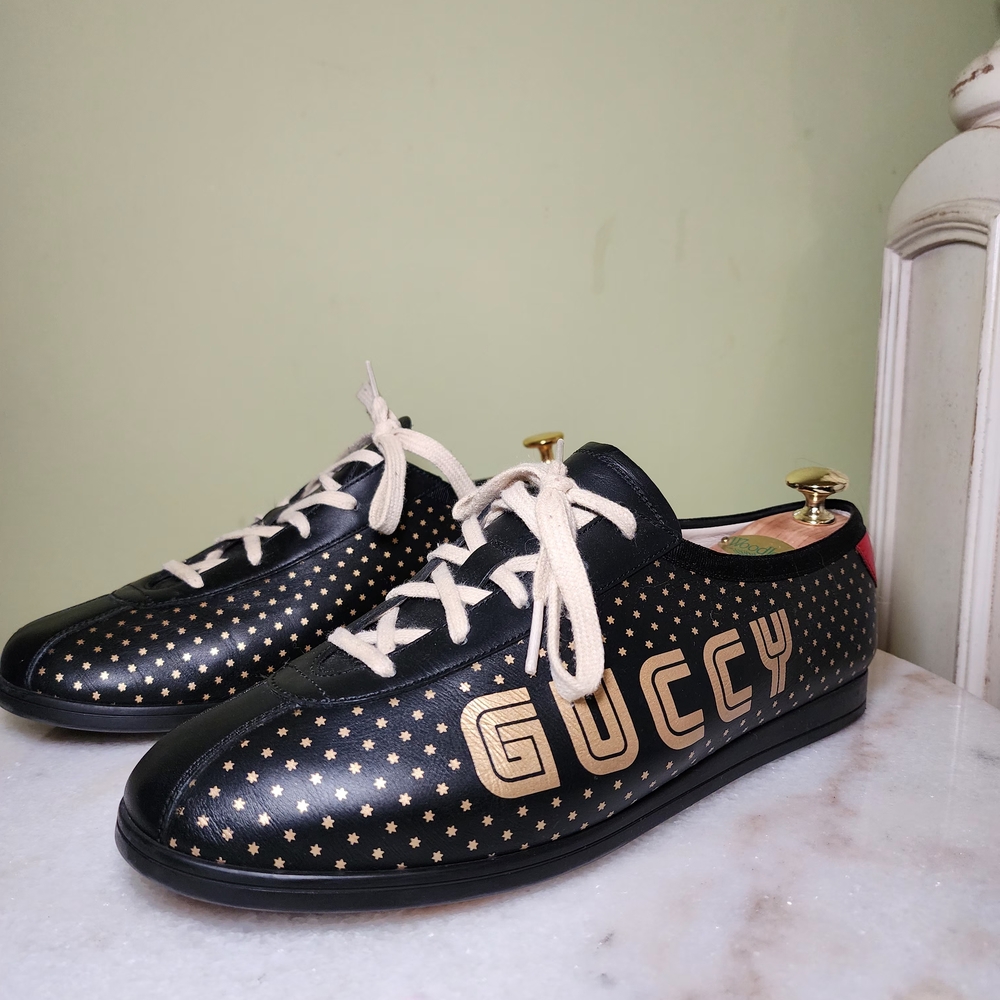 Gucci Black and Gold Star Sneakers